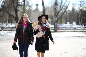 Girl on a walk in sunny weather