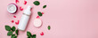 Skin care, body care products, rose leaves and petals, on a pink background. The concept of spa and natural skin care. Top view. Copy space
