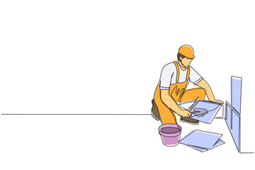 Poster - single one line drawing repair worker laying ceramic wall tile. professional tiler in uniform workin