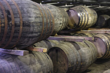 Oak Barrels In A Whiskey Distillery