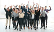 © ASDF - group of happy young business people celebrating together