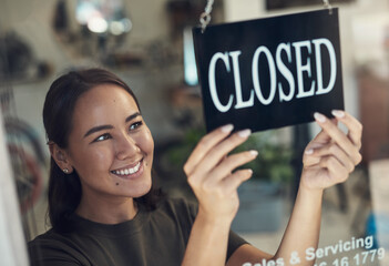 Aufkleber - Its been such a rewarding day. Shot of an attractive young woman standing and turning the sign on the door to her bicycle shop.