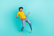 Full Length Portrait Of Overjoyed Carefree Person Listen Music Headphones Hands Play Imagine Guitar Isolated On Teal Color Background