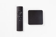 black multimedia TV box and remote controller
