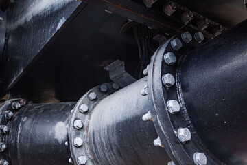 Large pipe connection with a large number of bolts and nuts enclosed on it. Pipeline. Pipeline state transportation system.