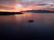 Aerial view of sailing vessels during golden hour anchoring near Tobelo, Halmahera, Indonesia.