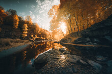 Landscape River Photography: Wide-angle Lens, Medium Distance, Fall Foliage, Backlit, Golden Hour - Generative Ai