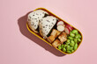 vegan bento lunch with onigiri