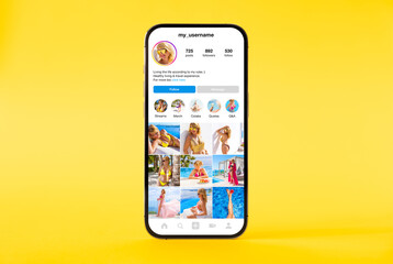 Wall Mural - mockup for social media user page with photo feed on mobile phone