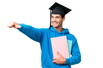 Wall Mural - Young university graduate man over isolated background giving a thumbs up gesture