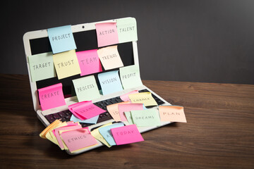 Sticker - Laptop computer with colorful sticky notes. Business