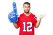 sports fan man over isolated chroma key background having doubts while raising hands