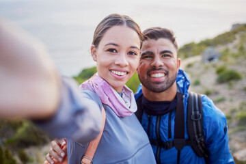 Man, woman and hiking selfie portrait with love, happiness and nature for outdoor adventure on holiday. Young happy couple, blog and mountain for care, bonding and vacation with social network