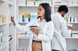 © M Einero/peopleimages.com - Pharmacy stock tablet, Indian pharmacist and nurse checklist of medicine and pills. Woman, digital work and pharmaceutical products in a retail shop or clinic with healthcare and wellness employee
