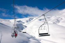 Ski Lift And Snow Slopes Of Ski Winter Resort