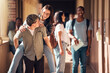 © David L/peopleimages.com - School, university or funny students in college joke as happy friends on lunch break outside of a learning classroom. Education, piggy back or excited girl walking with a romantic boyfriend on campus