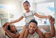 © David L/peopleimages.com - Happy family, smile and piggyback playing on sofa for quality bonding or relaxing together at home. Mother, father and child smiling for joy in playful fun and family time on the living room couch