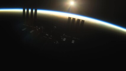 Wall Mural - international space station iss floating in orbit above planet earth in outer space. sunrise or suns