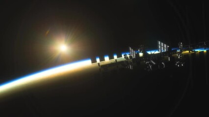 Wall Mural - international space station iss floating in orbit above planet earth in outer space. sunrise or suns