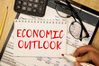 © Uladzislau - economic outlook - text word on the paper.
