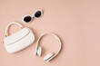 Flat lay with woman fashion accessories in white color. Fashion blog, summer urban style, shopping and trends concept