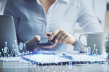 Fototapete - Double exposure of technology sketch hologram and woman holding and using a mobile device. Ai concept