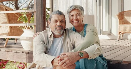 Poster - Senior couple, love and hug outdoor at home porch, bonding and smiling. Portrait, relax and retired, elderly and happy man and woman sitting on veranda outside house enjoying quality time together.