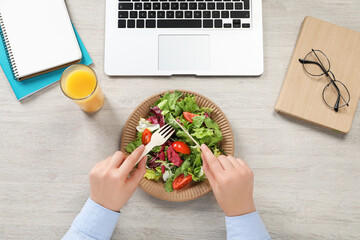 Office employee having business lunch at workplace, top view