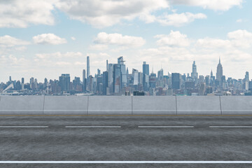 Wall Mural - Empty urban asphalt road exterior with city buildings background. New modern highway concrete construction. Concept of way to success. Transportation logistic industry fast delivery. New York. USA.