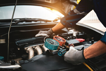 car care maintenance and service, hand technician auto mechanic using measuring manifold gauge check