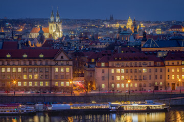 Wall Mural - Panoramic view over the cityscape of Prague at dramatic dusk, Czech Republic
