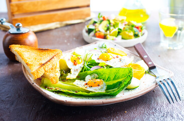 Wall Mural - Sandwich with Fried Egg and salad on plate