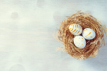 Wall Mural - Happy easter Day. Easter eggs on wooden background. Greetings and presents for Easter Day celebrate time. Flat lay ,top view, copy space.