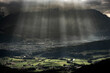 © Cavan Images - Scenic view of sunlight falling on landscape