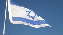Flag Of Israel With Clear Blue Skies