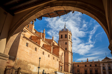 Sticker - view of the plaza de españa in lorca, region of murcia, spain, from an arch with the colegiata de sa