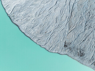 Wall Mural - drone view of the azure lake in the glacier valley. view of the moraines. landscape from the air. ri