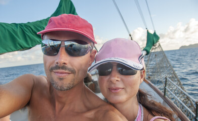 Sticker - Selfie of a happy caucasian couple on vacation relaxing during a cruise