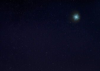 Wall Mural - Bright blue star in the night sky
