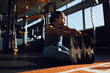 © Flamingo Images - Woman doing stretches in a gym
