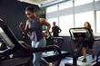 © Flamingo Images - Woman doing a gym treadmill class