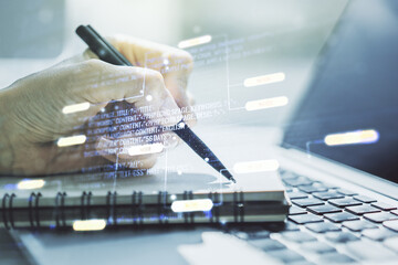 Poster - Multi exposure of abstract creative coding sketch and hand writing in notebook on background with laptop, artificial intelligence and neural networks concept