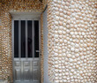 © acaballero67 - Facade of a house packed with white sea clam shells, in Galicia.