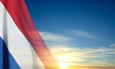 Netherlands flag on background of sky. Patriotic background. EPS10 vector