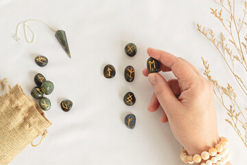 Set of rune stones for divination and fortune telling. Mystic still life with labradorite runes. Esoteric, occult , witchcraft rituals idea