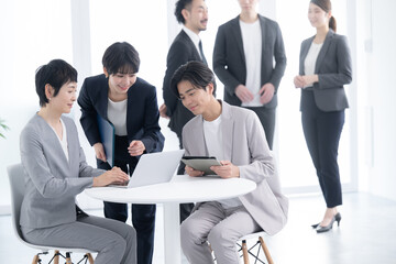 Wall Mural - Businessmen working in teams Business scene to be described