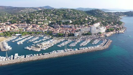 Wall Mural - Summer aerial view of French coastal town of Sainte-Maxime on Mediterranean coast overlooking marina with moored pleasure yachts 