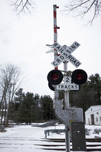 Low Angle View Of Railroad Crossing Sign Against Clear Sky
