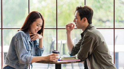 Poster - Young Asian couple dating at coffee shop