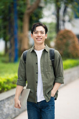 Wall Mural - Young Asian student at school